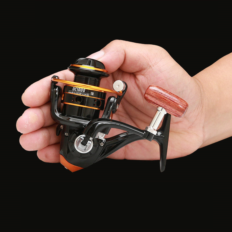 Upgrade Your Fishing Game with a Spinning Reel: Fish Wheel Coil Fixed Spool Gear Equipm