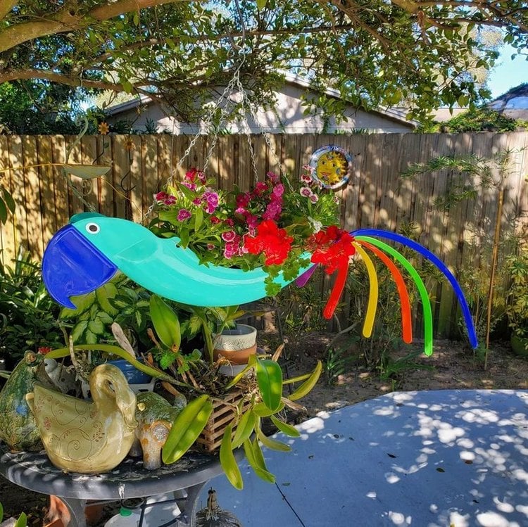 Colorful bird hanging planter